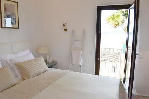 Postel nebo postele na pokoji v ubytování Sea View House Olja