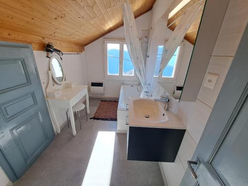 a small bathroom with a sink and a mirror at Ristorante Bellavista in Santa Maria