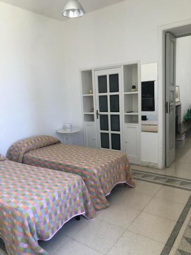 Postel nebo postele na pokoji v ubytování Volver B&B