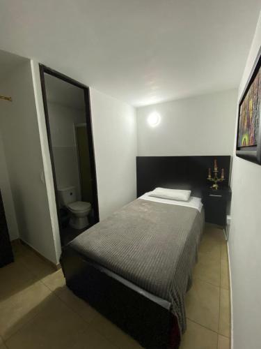 Cama o camas de una habitación en Destino Nómada Calle 11 n 1-38