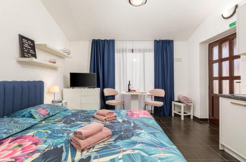 Posteľ alebo postele v izbe v ubytovaní Funcic Apartments 2 app
