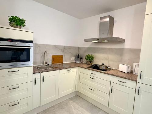 Η κουζίνα ή μικρή κουζίνα στο Apartment WH 10