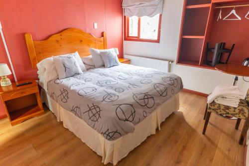 Postel nebo postele na pokoji v ubytování Hotel Milodon