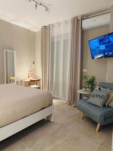 Postel nebo postele na pokoji v ubytování Casa Rosetta - Relax in Centro, Parcheggio Privato, Mare a 2 Passi
