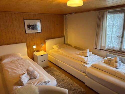 Ένα ή περισσότερα κρεβάτια σε δωμάτιο στο Quietly situated holiday home with marvelous mountain views