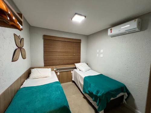 En eller flere senge i et værelse på 40 m da praia de São Miguel dos Milagres