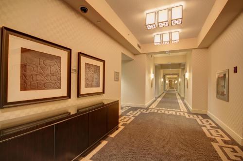 a hallway of a hospital with paintings on the walls at Caesars Windsor Hotel and Casino in Windsor