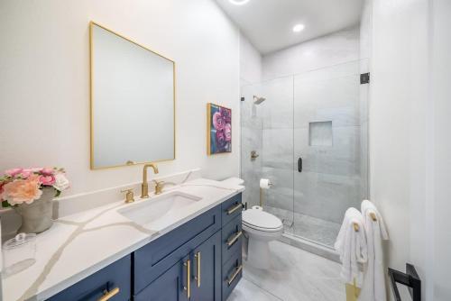 a bathroom with a sink and a shower at Austin Spacious Haven - Pool Jacuzzi Firepit in Bee Cave