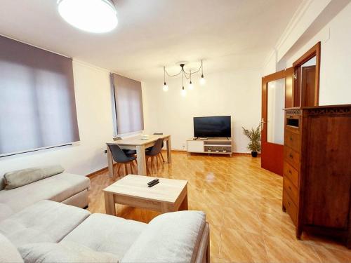 a living room with a couch and a table at Hansome flat in Ceuta