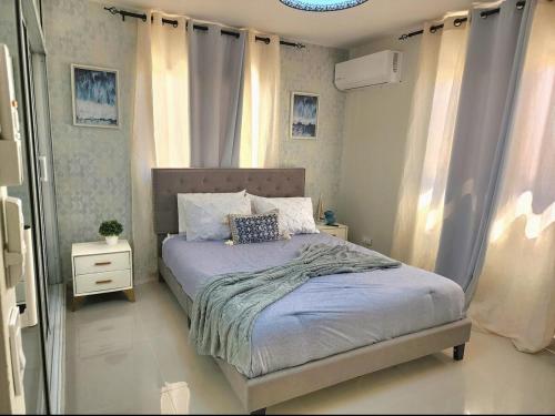 Cama o camas de una habitación en Atlantic Breeze House
