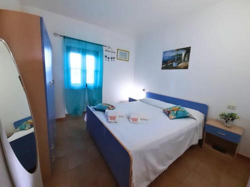 Postel nebo postele na pokoji v ubytování Villa Le Mezzane