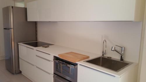 Dapur atau dapur kecil di Swimming pool & Beach access Residence