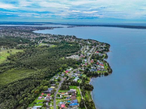 an aerial view of a island in a body of water at Aqua Vista Retreat in Karraganbah