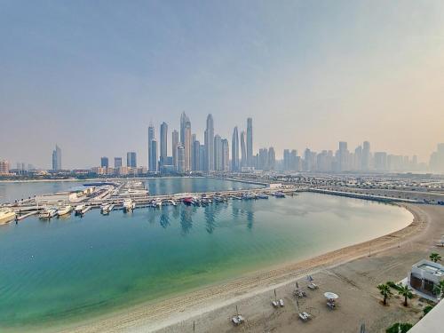 Vacationer Holiday Homes I Airy 1 Bedroom l Beach Access l Emaar Beachfront