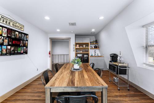 a dining room with a wooden table and chairs at Boerne Gem Near Downtown River Park Main Street in Boerne
