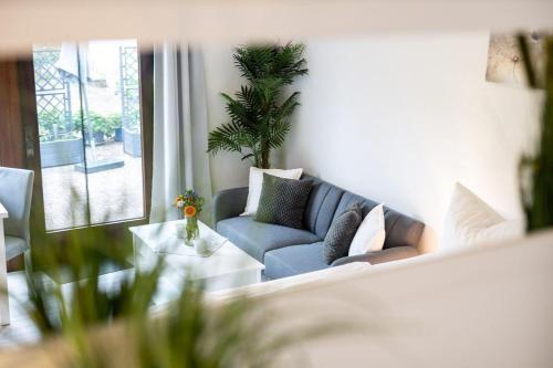 Ruang duduk di Ferienwohnung-Am-Strand