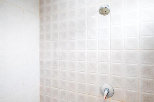 Ванная комната в Grha Minggiran Homestay Yogyakarta Mitra RedDoorz