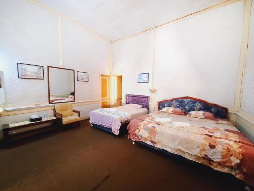 Postel nebo postele na pokoji v ubytování CATIMOR HERITAGE 1894 Hotel & Resto By Celcius