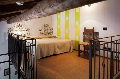 Ένα ή περισσότερα κρεβάτια σε δωμάτιο στο Agriturismo Terrenia