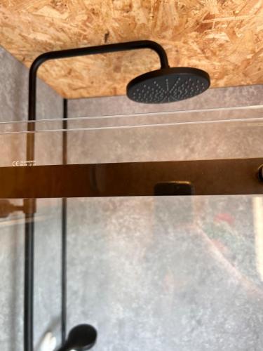 a metal shelf with two lights on top of it at The 9 acre in Midleton