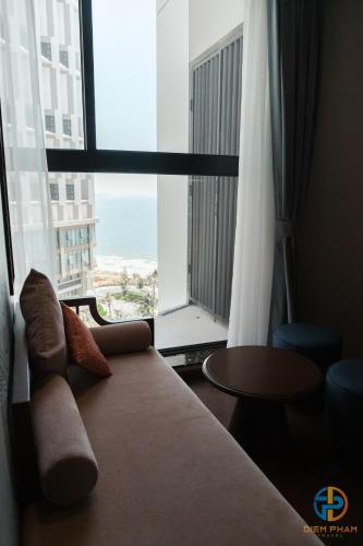Postel nebo postele na pokoji v ubytování Apec Mandala Cham Bay Mui Ne - Ruby Apartment