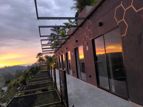 a building with a view of the mountains at San Gabriel Via Termales Santa Rosa in Santa Rosa de Cabal