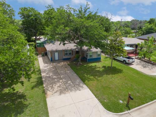 an aerial view of a house with a yard at Rare Exclusive Retreat Private Hot Tub King Bed in Saskatoon