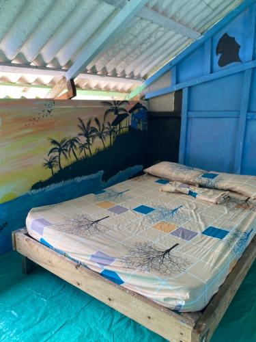Postel nebo postele na pokoji v ubytování Hostal el peñón