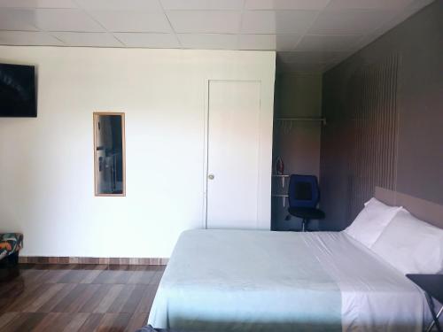 Postel nebo postele na pokoji v ubytování La casita de Issa via Boquete