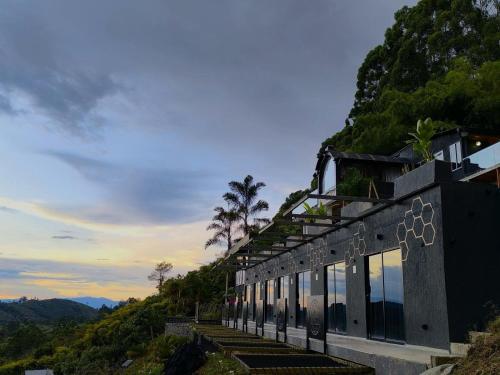 a building on top of a hill with a view at San Gabriel Via Termales Santa Rosa in Santa Rosa de Cabal