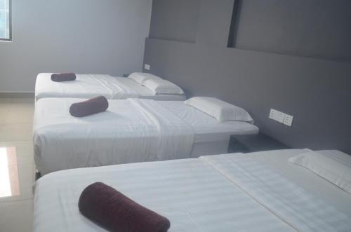 Ένα ή περισσότερα κρεβάτια σε δωμάτιο στο SOUTH BAY Hotel