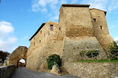 an old castle with a staircase leading up to it at Umbria nel cuore in Cannara