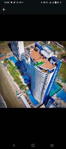 an overhead view of a tall building with aominium at GRAND DIAMOND BEACH Tonsupa Atacames in Tonsupa