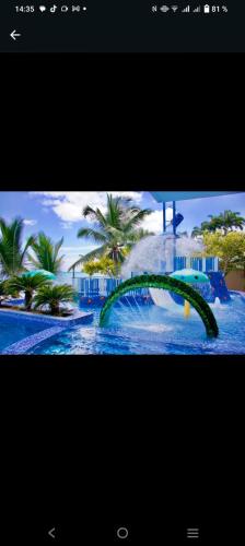 a collage of two pictures of a water park at GRAND DIAMOND BEACH Tonsupa Atacames in Tonsupa