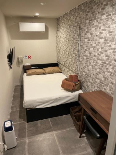 Postel nebo postele na pokoji v ubytování mr Hotel