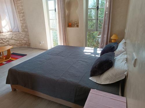 Postel nebo postele na pokoji v ubytování Villa La Palmeraie, Essaouira