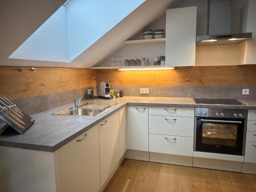 "EIGHT" Premium Apartments Seekirchen, charmante 3-Zi-Dachgeschoss-Wohnung mit Balkon