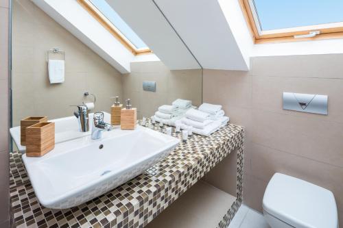 Koupelna v ubytování Laura Lux Suites
