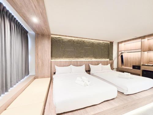 Ascella Bangkok Hotelにあるベッド