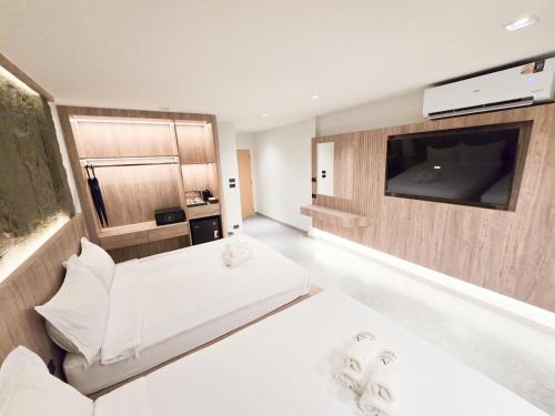 Ascella Bangkok Hotelにあるテレビまたはエンターテインメントセンター