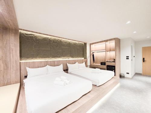 Ascella Bangkok Hotelにあるベッド