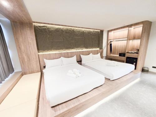 Ascella Bangkok Hotelにあるベッド