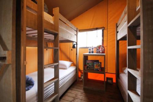 a room with two bunk beds and a window at BIG4 Yarra Valley Park Lane Holiday Park in Healesville
