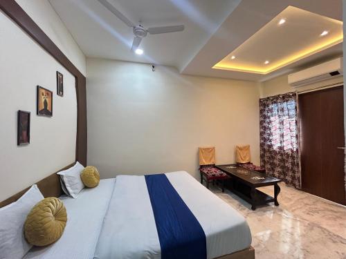 Ένα ή περισσότερα κρεβάτια σε δωμάτιο στο Jagannath guest house
