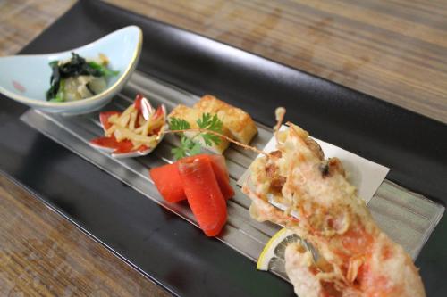 旅館の敷地内または近くでの食事または食べ物
