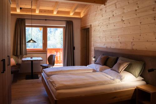 Ένα ή περισσότερα κρεβάτια σε δωμάτιο στο Tischlerhof