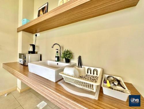 a kitchen counter with a sink in a room at Austin Cube 8 Teens by RR JBcity in Johor Bahru