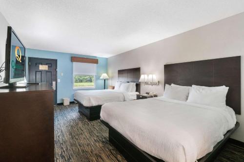 Ένα ή περισσότερα κρεβάτια σε δωμάτιο στο Quality Inn Adairsville-Calhoun South