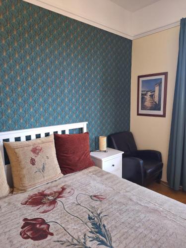 Postel nebo postele na pokoji v ubytování Heart House Szív Ház
