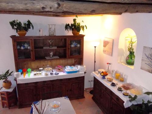 a room with a table with food on it at L'Arabesco B&B in Amalfi